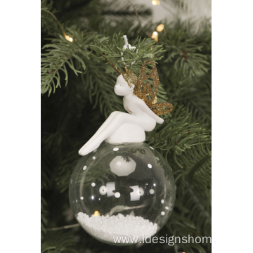 Elegant Angel Sits On A Glass Globe